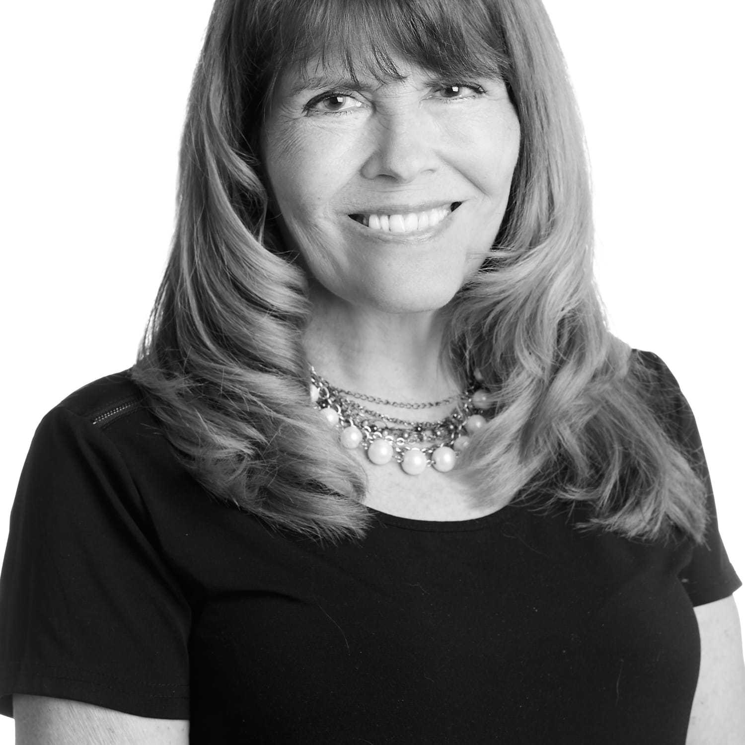 Portrait of Mary Ann, a professional stylist at Izzazu Salon, showcasing their expertise and style.