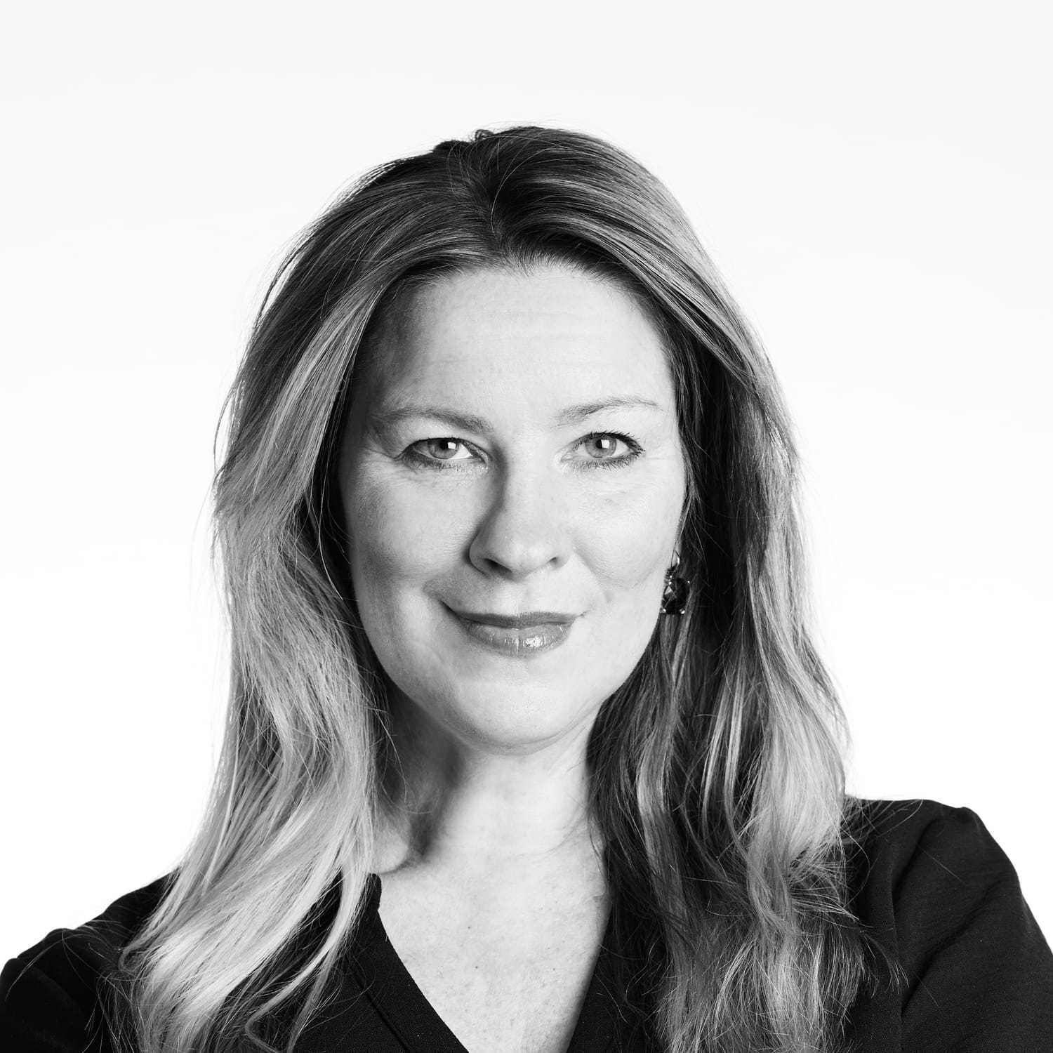 Portrait of Brandy, a professional stylist at Izzazu Salon, showcasing their expertise and style.