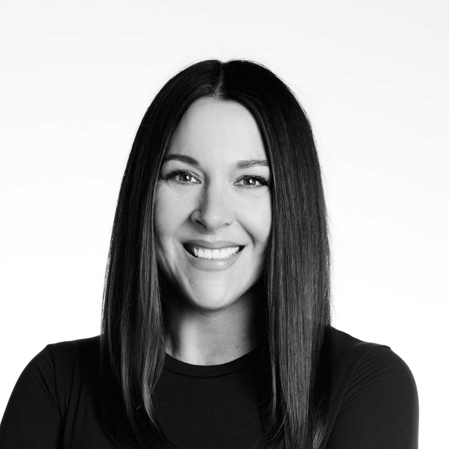 Portrait of Valerie, a professional stylist at Izzazu Salon, showcasing their expertise and style.