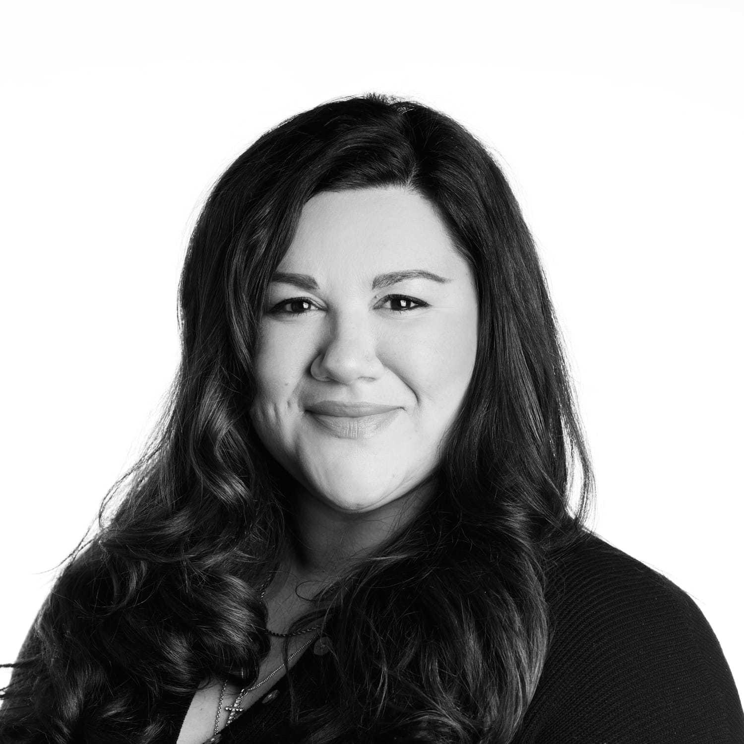 Portrait of Lauren F, a professional stylist at Izzazu Salon, showcasing their expertise and style.