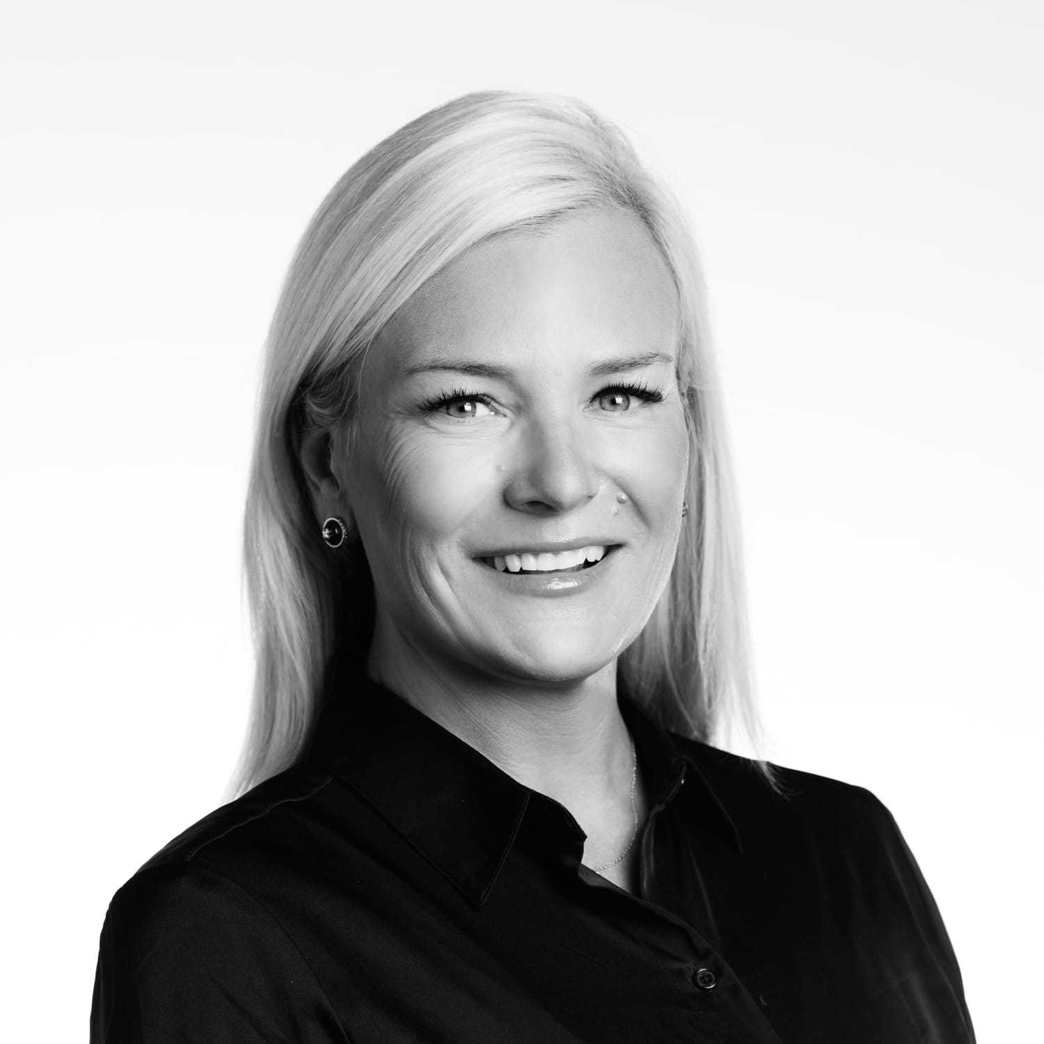 Portrait of Michelle, a professional stylist at Izzazu Salon, showcasing their expertise and style.