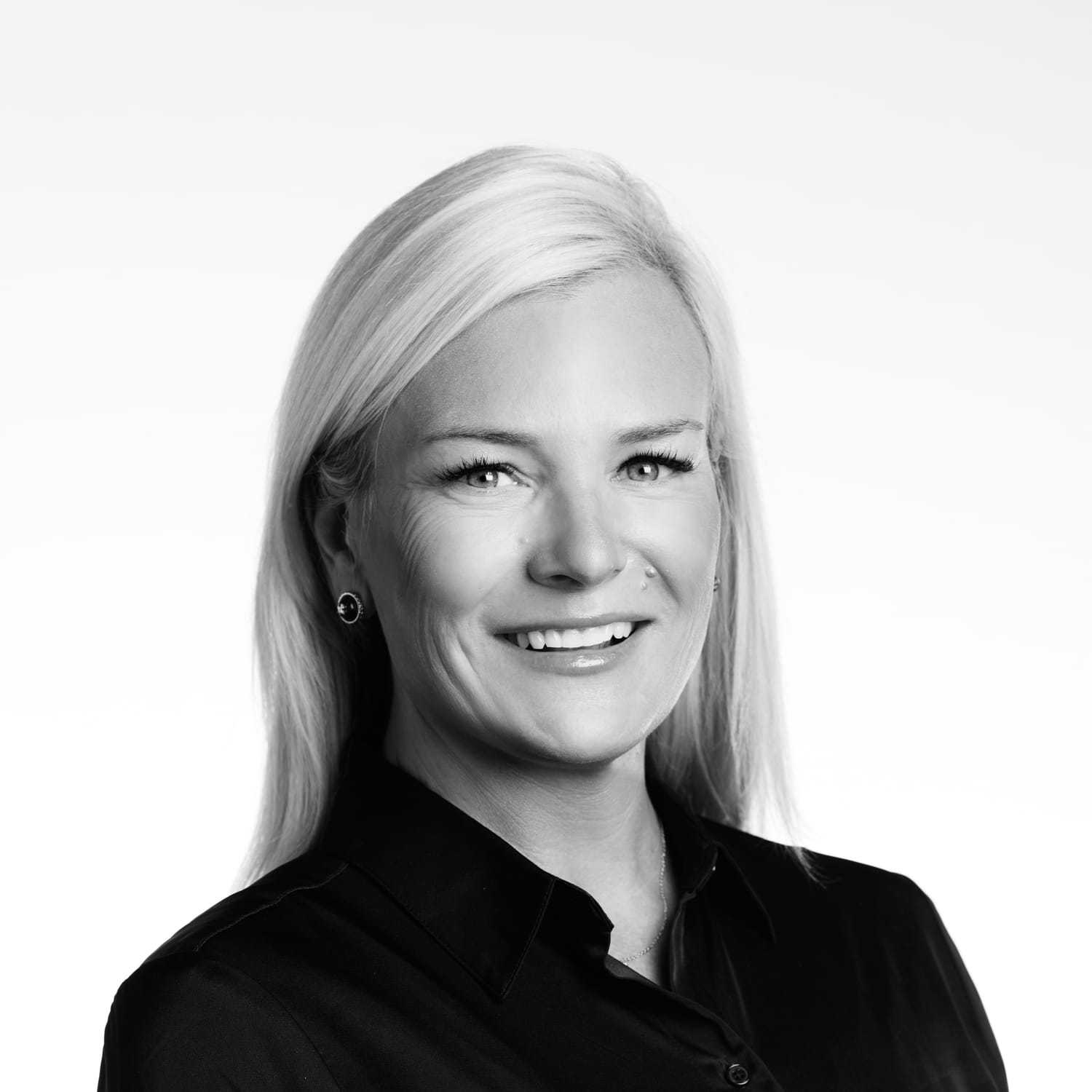 Portrait of Michelle, a professional stylist at Izzazu Salon, showcasing their expertise and style.