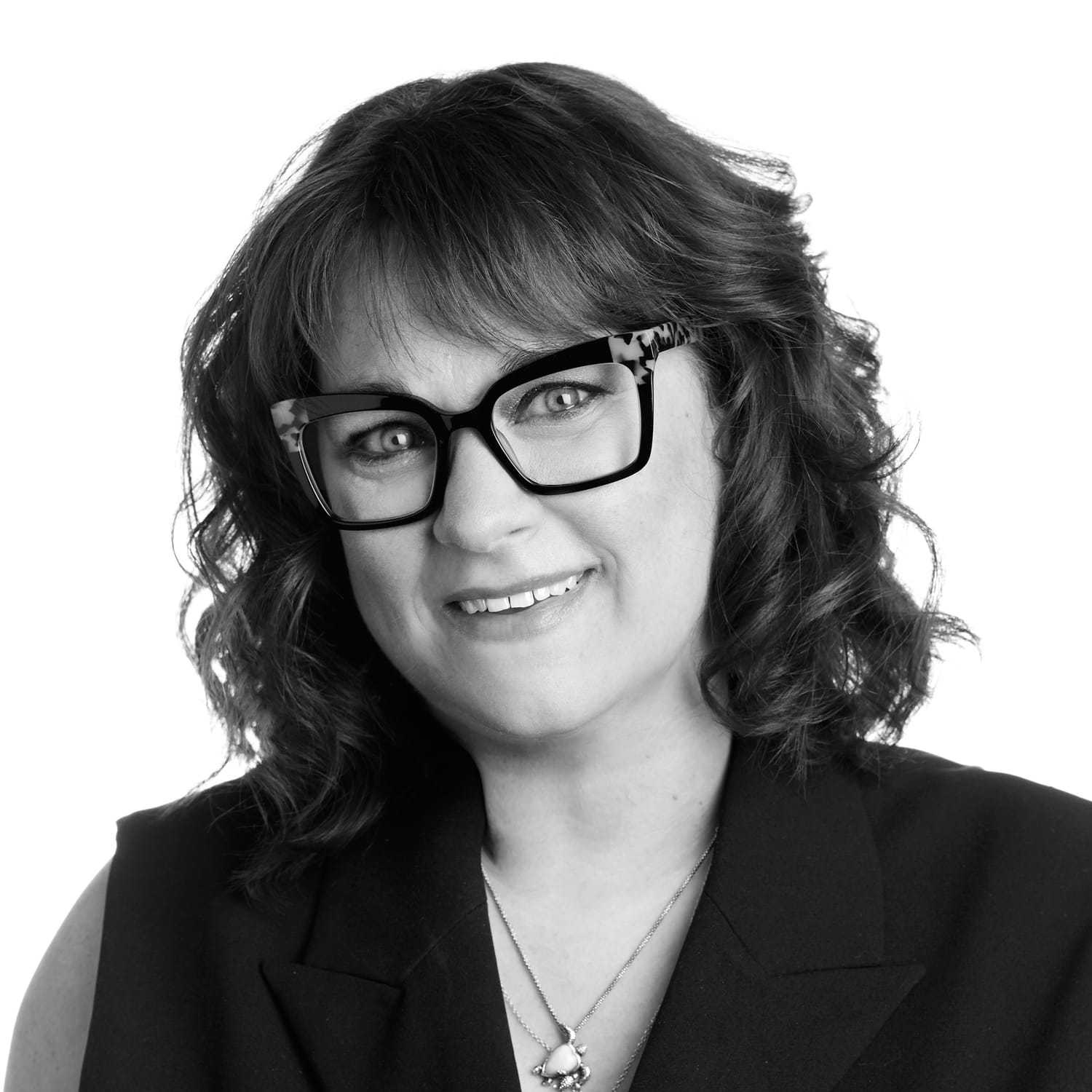 Portrait of Mandy, a professional stylist at Izzazu Salon, showcasing their expertise and style.