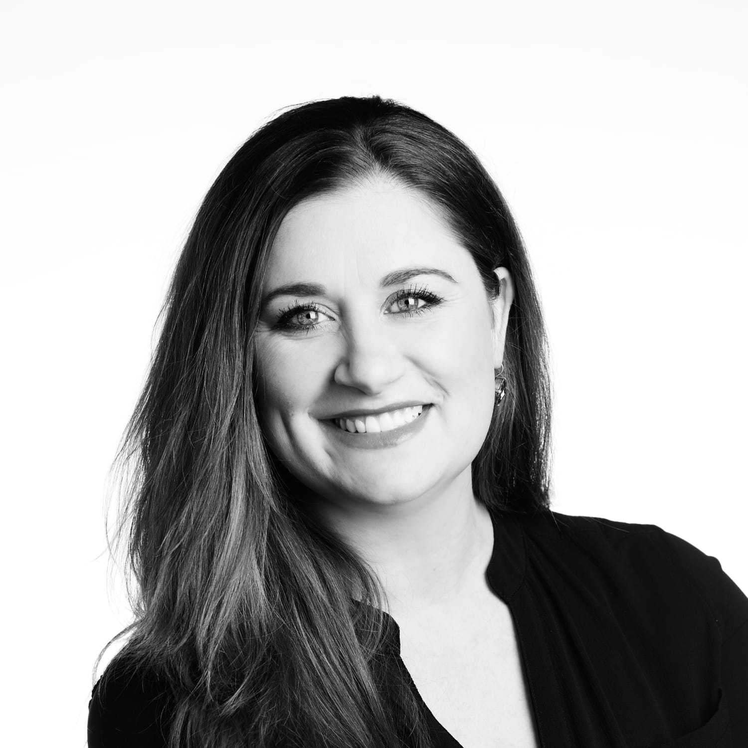 Portrait of Amanda, a professional stylist at Izzazu Salon, showcasing their expertise and style.